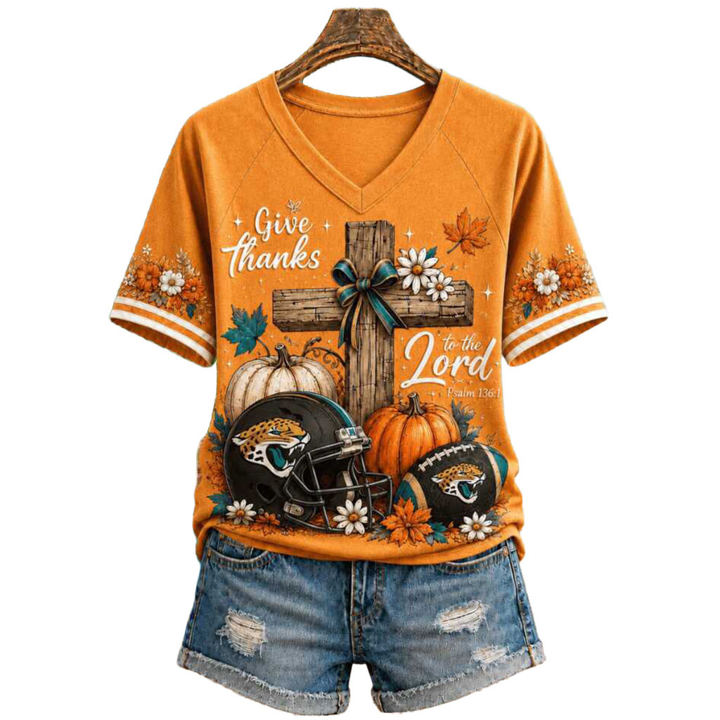 Jacksonville Jaguars Give Thanks To The Lord Pumpkin Cross V-Neck Shirt Jaguars Merch 2026 Jacksonville Jaguars Give Thanks To The Lord Pumpkin Cross V-Neck Shirt Jaguars Merch 2026
